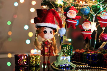 Fototapeta na wymiar Christmas tree with decorative lighting and beautiful accessories.