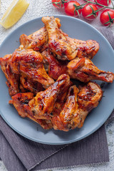 baked chicken pieces in teriyaki sauce, closeup, top view