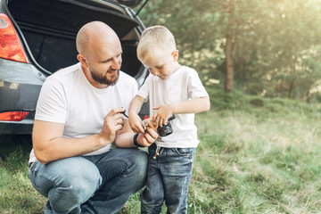 Happy Father and Son Having Fun, Enjoying Sunny Summer Day