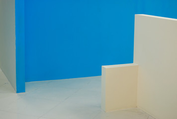 beige and blue walls in the interior. abstract composition.
