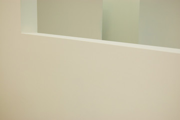beige walls and shadows of empty space. abstract composition.