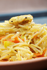 Fried noodles in plate closeup