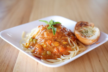 spaghetti bolognese sauce on table