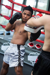 Fototapeta na wymiar boxer training in boxer ring