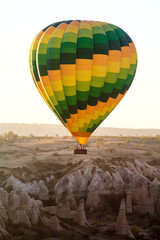 Multi-colored balloon in the air