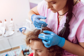 Platelet rich plasma injection procedure. Hair growth stimulation.