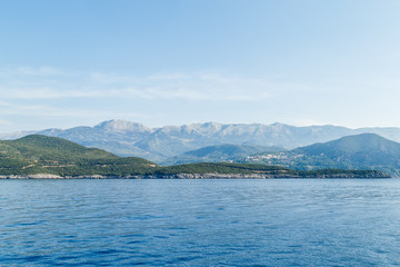 Fototapeta na wymiar Budva Riviera in Montenegro, view from the sea on a summer day
