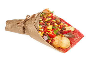 Original bouquet consisting of different varieties of sausage, meat, smoked cheese, tomatoes, pepper and bread lies on the white background