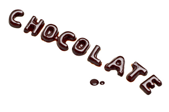 Chocolate Lettering With Chocolate Sauce On White Background