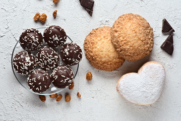 chocolate and pastries on white rustic background