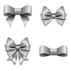 Shiny silver satin bow on a white background.