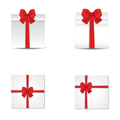 Collection of gift boxes with satin red bows.