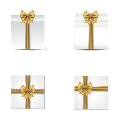 Collection of gift boxes with satin red bows.