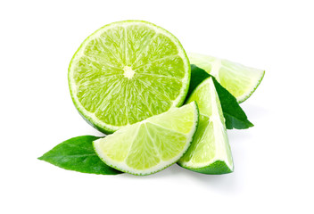 Limes with slices and leaves isolated