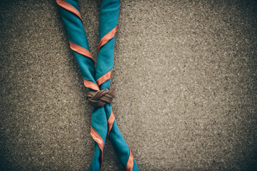 Orange,blue and yellow frame scout scarf. Concept is learning Scout subject. - obrazy, fototapety, plakaty