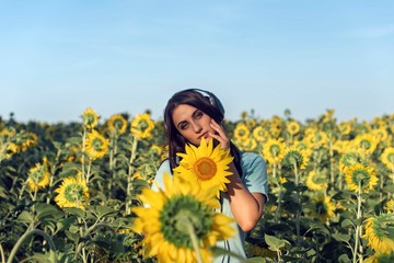 Summer walk in the countryside with a girl