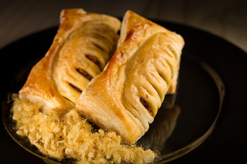 Dried shredded pork pie, Fresh homemade bakery on black dish, selective focus
