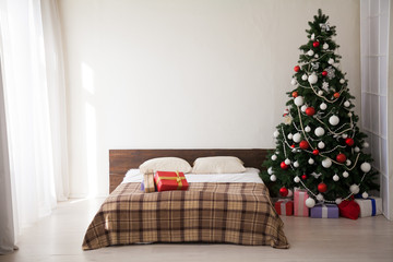 Christmas new year tree Interior bedroom and bed with gifts
