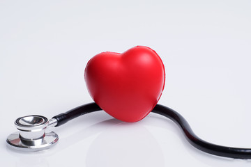 Healthcare or medical concept. Stethoscope and a red heart on a white background.