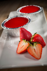 Strawberry Cupcake, homemade bakery pastry with fresh strawberry on white dish, selective focus