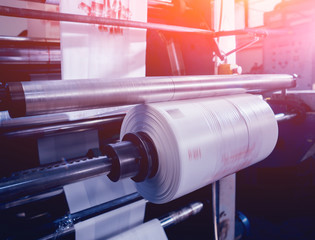 Modern automated production line in factory. Plastic bag manufacturing process
