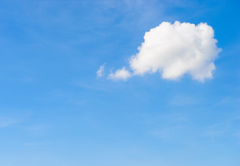 Naklejka na ściany i meble White cloud in the sky with the shape of a cartoon thinking balloon