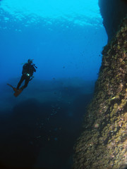 Fototapeta na wymiar Scuba Diving Malta - Wied il-Mielah Arch and caverns, Gozo