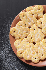 Sweet cookies in plate