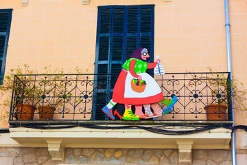 Jaia Corema, a traditional symbol of Lent in Mallorca on the facade of a house in Esporles