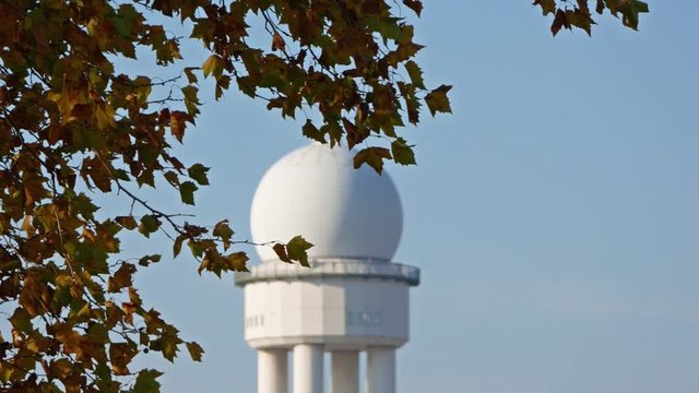 RRP 117 Radar Tower In Public City Park Tempelhofer Feld Behind Autumn Leaves In Berlin, Germany, Selected Focus Zoom Out