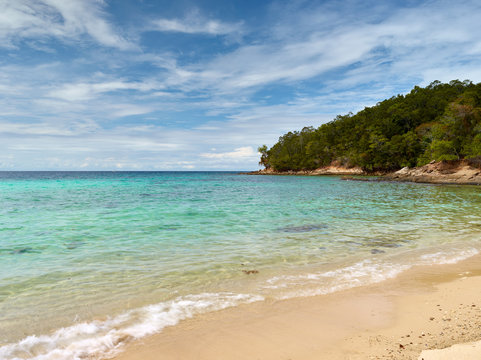 Seascape view of Iscland covered with tropical forest