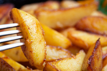 Fried potatoes close-up