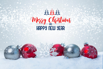 Red and silver christmas balls with snow © JavierArtPhotography