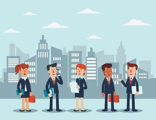 Young businessmen and business women talking and discussing in the city street