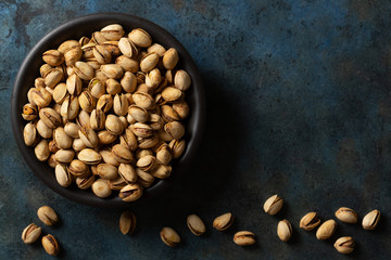 Pistachio in a Black Bowl