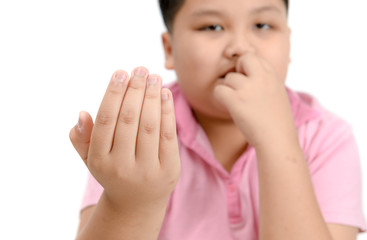 Disgusting bitten fingernails on boy's hand isolated