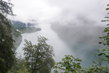 View of the mountain lake in the clouds