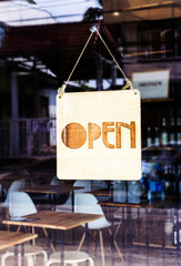 Open sign in street cafe