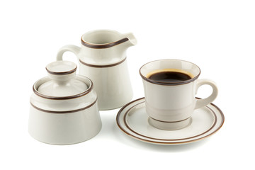 Obraz na płótnie Canvas Set of Porcelain coffee and tea with sugar bowl and milk container isolated on white background. with clipping path inside..