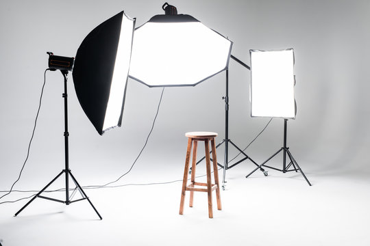 Modern photo studio interior with professional lighting equipment