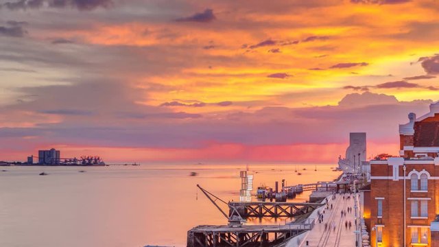 Elevated sunset view of the Padrao dos Descobrimentos Monument to the Discoveries timelapse famous monument on the banks of the River Tagus in Lisbon