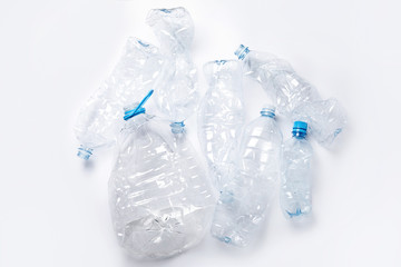 Concepts of pollution and recycling. Different used plastic bottles