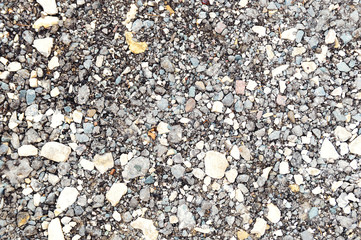 background made of a closeup of a pile of pebbles