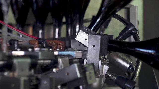 Champagne bottles on factory conveyor belt,wash bottles for bottling