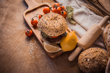 Hamburger homemade on wood table.