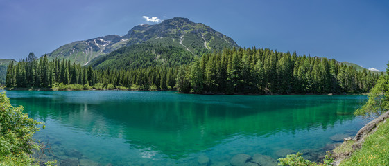 lake in the mountains, obernberger see, tirol, austria