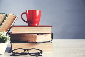 cup of coffee on books