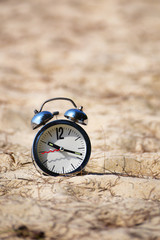 Clock on tropical beach work life balance concept and time management idea