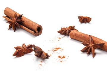 Cinnamon sticks and star anise isolated on white background