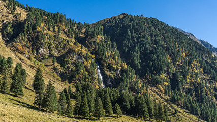 Fototapeta na wymiar view of mountains with waterfall